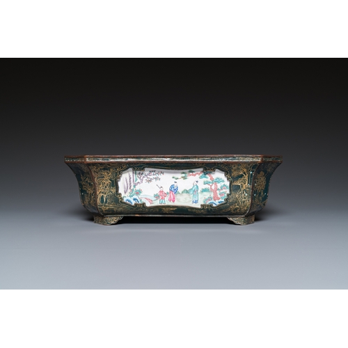 938 - A Chinese Canton enamel gilt-decorated dark-green-ground jardiniere with four inserted plaques, Qian... 