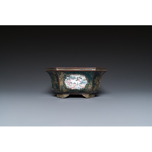 938 - A Chinese Canton enamel gilt-decorated dark-green-ground jardiniere with four inserted plaques, Qian... 