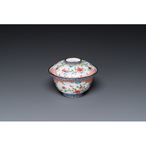 943 - A Chinese Canton enamel covered bowl with flowers and butterflies, Yongzheng/QianlongDia.: 12 cm - H... 