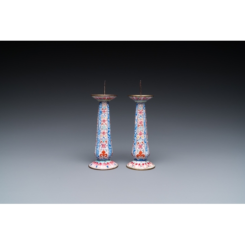 948 - A pair of Chinese Canton enamel candlesticks, Yongzheng/QianlongH.: 13 cm