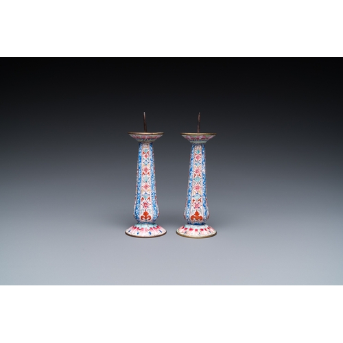 948 - A pair of Chinese Canton enamel candlesticks, Yongzheng/QianlongH.: 13 cm