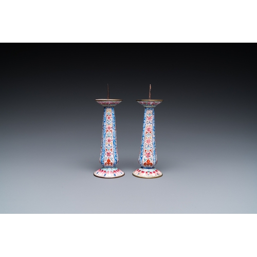 948 - A pair of Chinese Canton enamel candlesticks, Yongzheng/QianlongH.: 13 cm