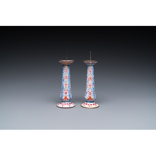 948 - A pair of Chinese Canton enamel candlesticks, Yongzheng/QianlongH.: 13 cm