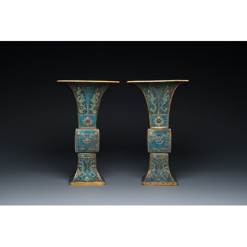 957 - A pair of Chinese cloisonne 'gu' vases, KangxiH.: 36 cm