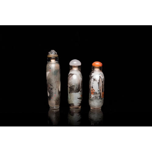 966 - Three Chinese inside-painted glass snuff bottles, 20th C.H.: 9 cm (the tallest)