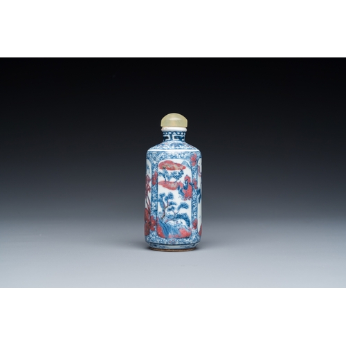 974 - A Chinese blue, white and copper-red snuff bottle, 19th C.H.: 8,5 cm