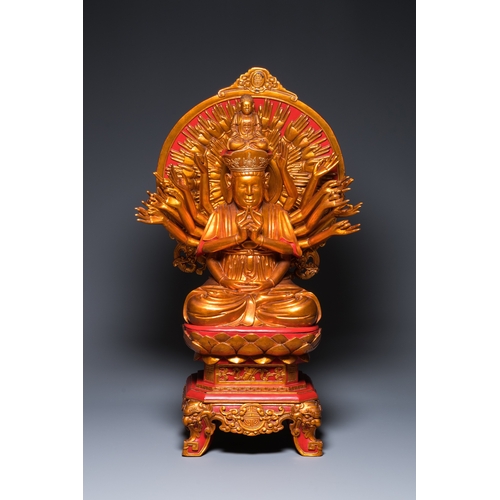 1002 - A large Vietnamese red-and-gilt-lacquered wood sculpture of Avalokitesvara with 18 arms, 19/20th C.H... 