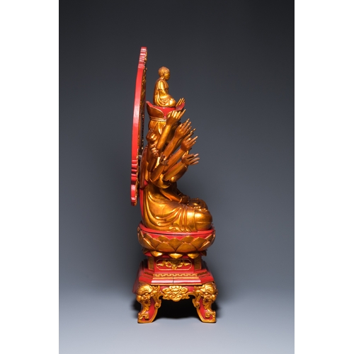 1002 - A large Vietnamese red-and-gilt-lacquered wood sculpture of Avalokitesvara with 18 arms, 19/20th C.H... 