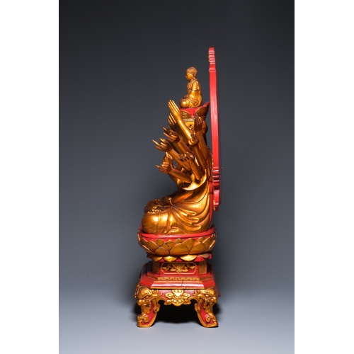 1002 - A large Vietnamese red-and-gilt-lacquered wood sculpture of Avalokitesvara with 18 arms, 19/20th C.H... 