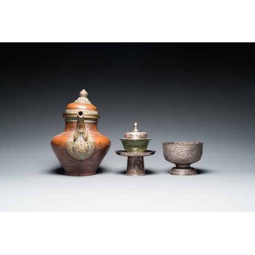 1019 - Five Tibetan ritual objects in copper, silver, jade and wood, 19/20th C.L.: 29,5 cm - H.: 27 cm (the... 