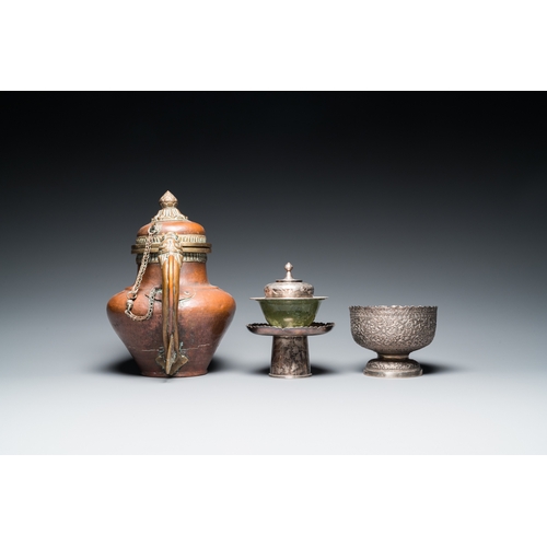 1019 - Five Tibetan ritual objects in copper, silver, jade and wood, 19/20th C.L.: 29,5 cm - H.: 27 cm (the... 