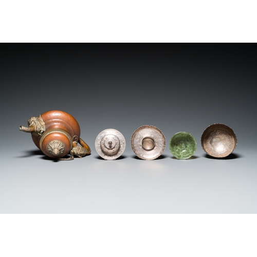 1019 - Five Tibetan ritual objects in copper, silver, jade and wood, 19/20th C.L.: 29,5 cm - H.: 27 cm (the... 