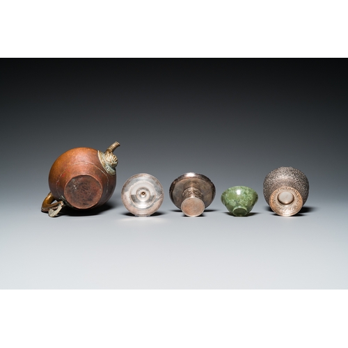 1019 - Five Tibetan ritual objects in copper, silver, jade and wood, 19/20th C.L.: 29,5 cm - H.: 27 cm (the... 