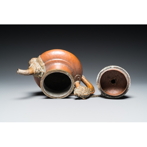 1019 - Five Tibetan ritual objects in copper, silver, jade and wood, 19/20th C.L.: 29,5 cm - H.: 27 cm (the... 