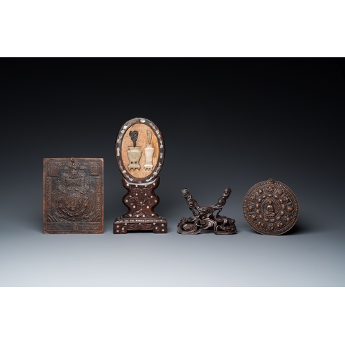 1020 - A varied collection of Chinese and Tibetan bronze, brass and wood objects, 19/20th C.H.: 30 cm (the ... 