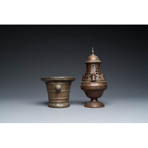 1207 - A bronze mortar, a censer and two pax of which one gilded, Western Europe, 16/17th C.H.: 21 cm (the ... 