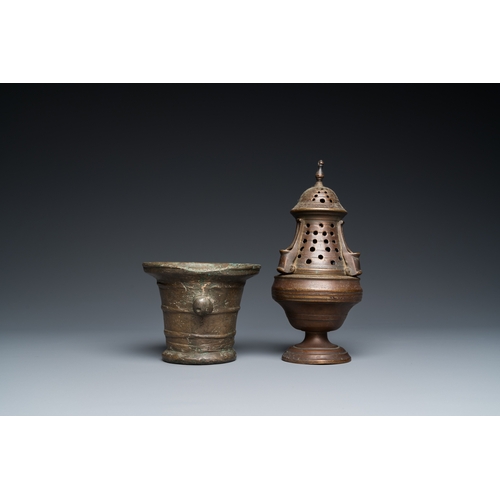 1207 - A bronze mortar, a censer and two pax of which one gilded, Western Europe, 16/17th C.H.: 21 cm (the ... 