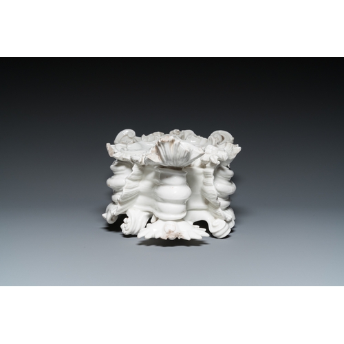 1226 - A blanc de Chine porcelain rococo case clock, probably Meissen, 18th C.H.: 38 cm