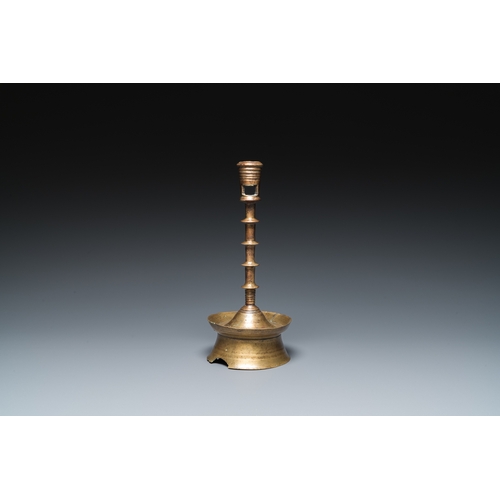 1238 - A Dutch or Flemish knotted bronze candlestick, 15/16th C.H.: 23,5 cm
 
 Provenance:- The collection ... 