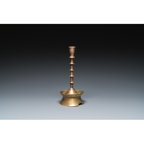 1238 - A Dutch or Flemish knotted bronze candlestick, 15/16th C.H.: 23,5 cm
 
 Provenance:- The collection ... 