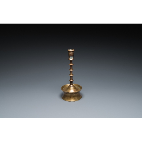 1238 - A Dutch or Flemish knotted bronze candlestick, 15/16th C.H.: 23,5 cm
 
 Provenance:- The collection ... 