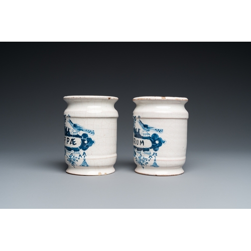 1273 - Two Dutch Delft blue and white drug jars and a polychrome Brussels faience dish with a rider on hors... 