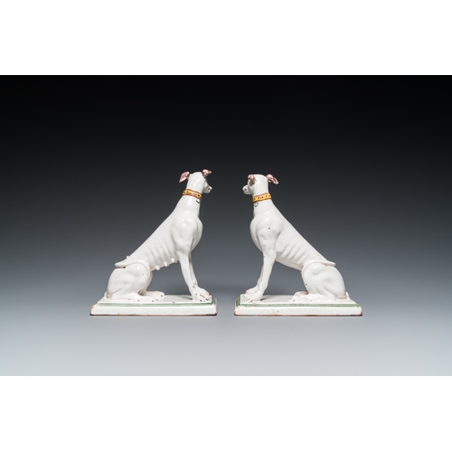 1275 - A pair of polychrome Brussels faience greyhounds, 18th C.H.: 21,5 cmDim.: 18,5 x 9,5 cm (the base)... 