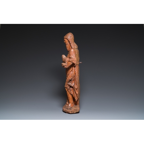 1284 - A large carved oak sculpture of John the Baptist holding the Lamb, 16th C.H.: 74,5 cm
 
 Depicted st... 