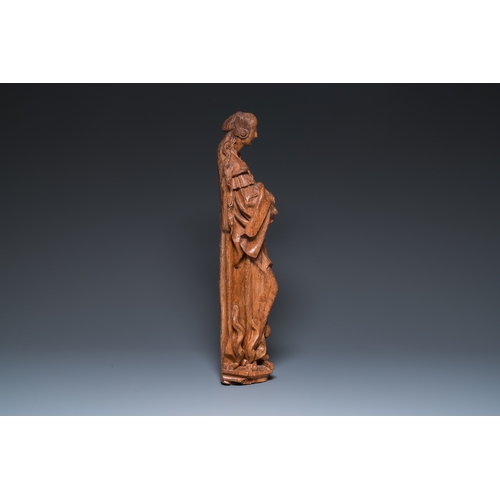 1289 - A Flemish carved oak sculpture of a female saint on a pyre, Brabant region, first half 16th C.H.: 64... 