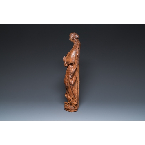 1289 - A Flemish carved oak sculpture of a female saint on a pyre, Brabant region, first half 16th C.H.: 64... 