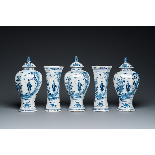 1312 - A Dutch Delft blue and white five-piece chinoiserie garniture, 1st quarter 18th C.H.: 32,5 cm (the t... 