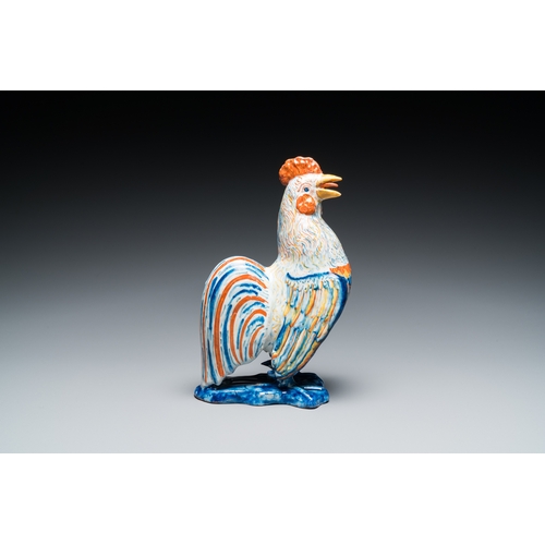 1316 - A fine polychrome Dutch Delft model of a rooster, 18th C.H.: 20,5 cm
 
 The base with an illegible s... 