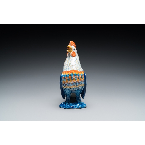 1316 - A fine polychrome Dutch Delft model of a rooster, 18th C.H.: 20,5 cm
 
 The base with an illegible s... 