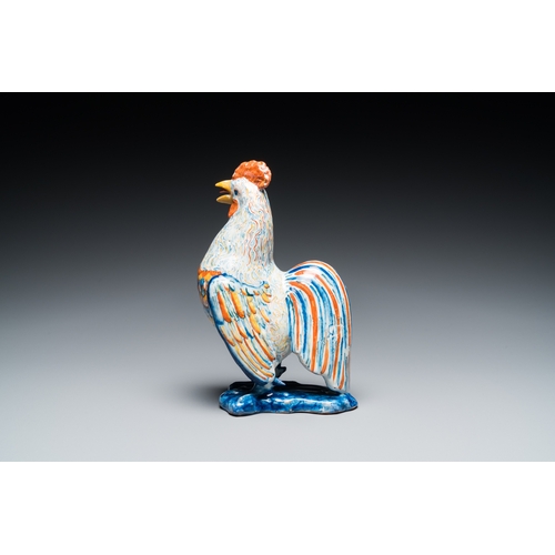 1316 - A fine polychrome Dutch Delft model of a rooster, 18th C.H.: 20,5 cm
 
 The base with an illegible s... 