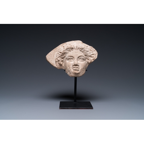 1388 - A Greek terracotta with white engobe antefix in the shape of a woman's head, 5/4th C. b.C.H.: 13 cm ... 