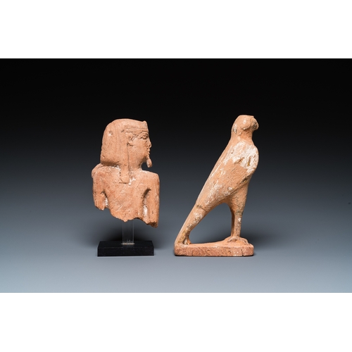 1396 - An Egyptian wooden Horus falcon and a fragment of a farao sculpture, Late PeriodH.: 19 cm
 
 Provena... 