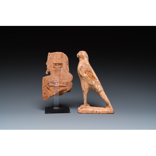 1396 - An Egyptian wooden Horus falcon and a fragment of a farao sculpture, Late PeriodH.: 19 cm
 
 Provena... 