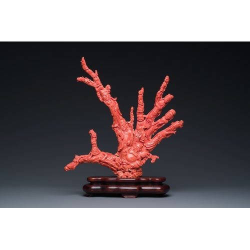 265 - A large Chinese red coral 'Baxian' group, 19/20th C.Description:H 45 - L 38 cm (incl. stand) Weight:... 