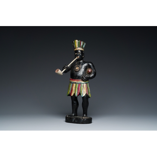 350 - An English polychromed wood sculpture of a pipe-smoking Indian from a tobacco store, 18th C.Descript... 