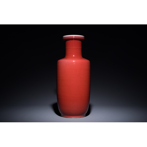 10 - A Chinese monochrome copper-red rouleau vase, 18/19th C.Description:H.: 45 cmCondition:The absence o... 