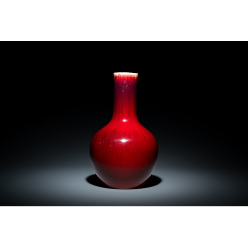 11 - A Chinese flambe-glazed bottle vase, 18/19th C.Description:H.: 38,5 cmCondition:The absence of a con... 