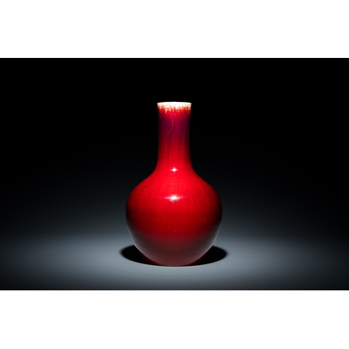 11 - A Chinese flambe-glazed bottle vase, 18/19th C.Description:H.: 38,5 cmCondition:The absence of a con... 