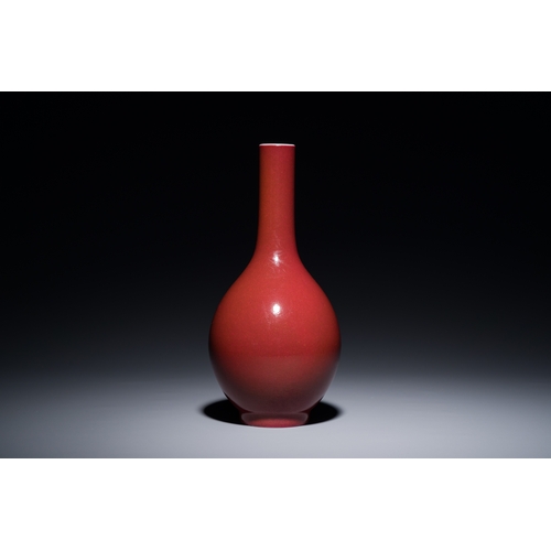 18 - A Chinese monochrome dark ruby-red-glazed bottle vase, Qianlong mark and of the periodDescription:H.... 