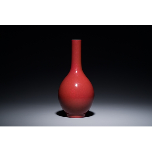 18 - A Chinese monochrome dark ruby-red-glazed bottle vase, Qianlong mark and of the periodDescription:H.... 