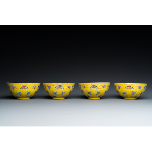 3 - Four Chinese famille rose yellow-ground 'butterfly' bowls, Tongzhi mark and of the periodDescription... 