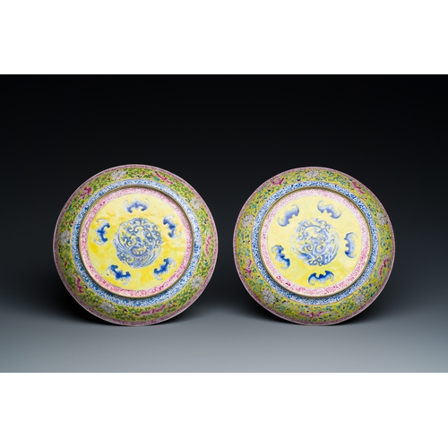 36 - A pair of Chinese Canton enamel plates with exceptionally fine floral design, YongzhengDescription:D... 