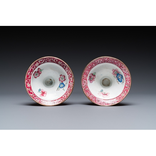 37 - A pair of Chinese Canton enamel 'lotus' candlesticks, YongzhengDescription:H.: 25 cmCondition:The ab... 