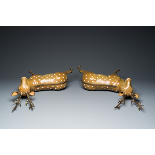 45 - A very fine and large pair of Chinese cloisonne models of deer on reticulated wooden stands, 19th C.... 