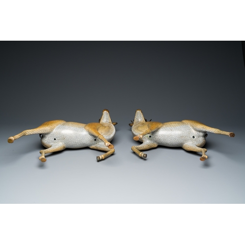 45 - A very fine and large pair of Chinese cloisonne models of deer on reticulated wooden stands, 19th C.... 