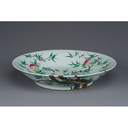 46 - A fine and large Chinese famille rose 'nine peaches' dish, Qianlong mark, 19th C.Description:Dia.: 5... 